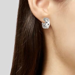 AUTHENTIC CHANEL MATELASSE SOLID WHITE GOLD HUGGY EARRINGS